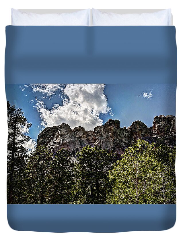 Sculpture Duvet Cover featuring the photograph Faces of the Past by Deborah Klubertanz