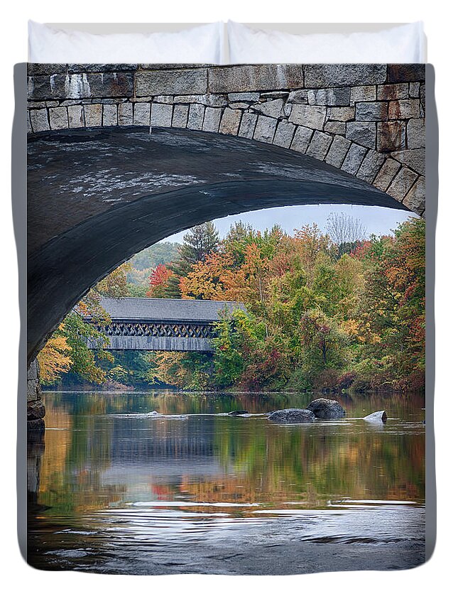  Duvet Cover featuring the photograph fall colors over Henniker covered bridge by Jeff Folger