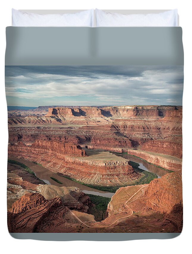 Dead Horse Point Duvet Cover featuring the photograph First Light at Dead Horse Point by Denise Bush