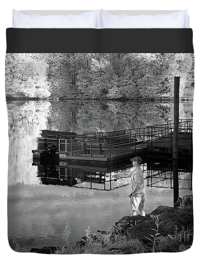 Needwood Duvet Cover featuring the photograph Fisherman at a lake by Izet Kapetanovic