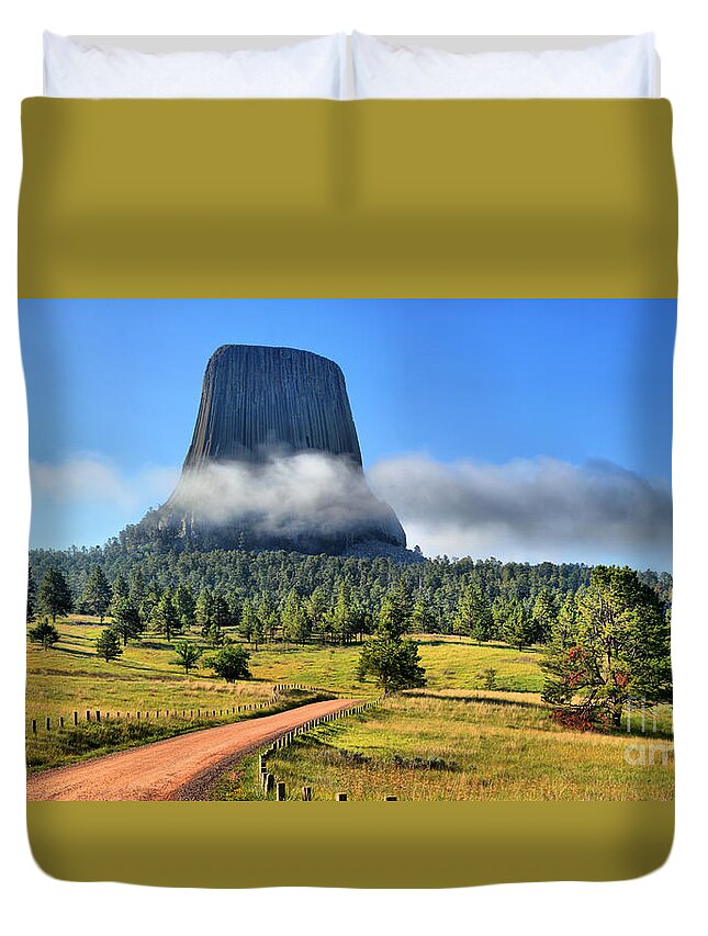 Devils Tower Duvet Cover featuring the photograph Fog Around The Tower by Adam Jewell
