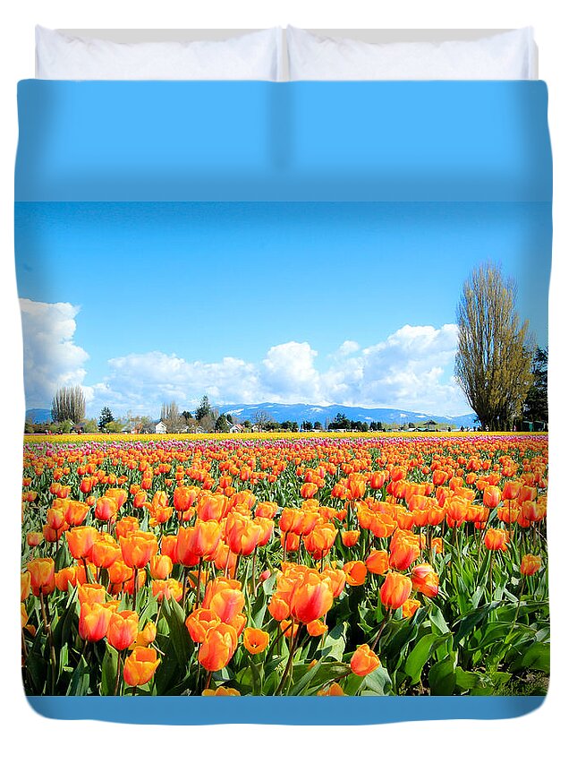 Tulip Fields Duvet Cover featuring the photograph Front Row in Orange by E Faithe Lester