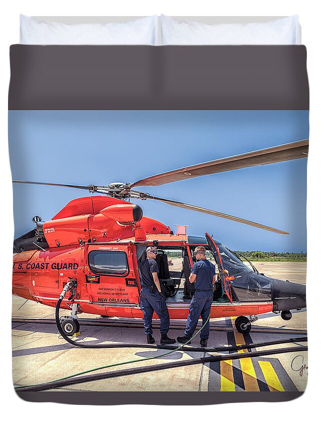 Us Coast Guard Air Station New Orleans All Hands Unit Photo Shoot Duvet Cover featuring the photograph Fueling the Helicopter by Gregory Daley MPSA