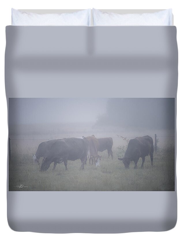 Cows Duvet Cover featuring the photograph Grazing cows in the mist by Torbjorn Swenelius