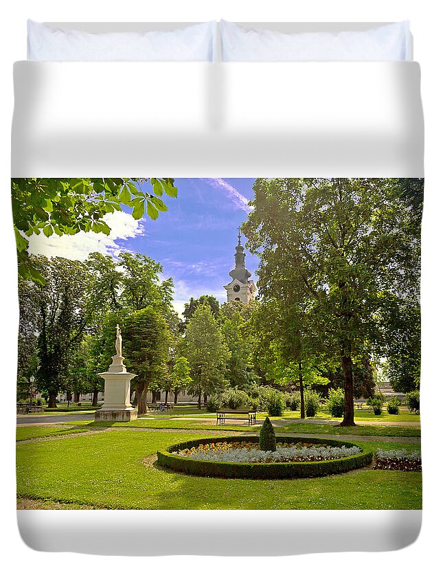 Bjelovar Duvet Cover featuring the photograph Green park and church in Bjelovar by Brch Photography