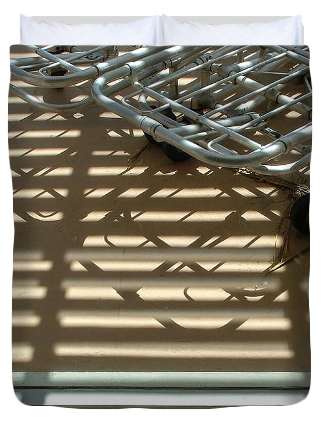 Shadows Duvet Cover featuring the photograph Gurneys Under a Pergola Through a Picture Window by Stan Magnan