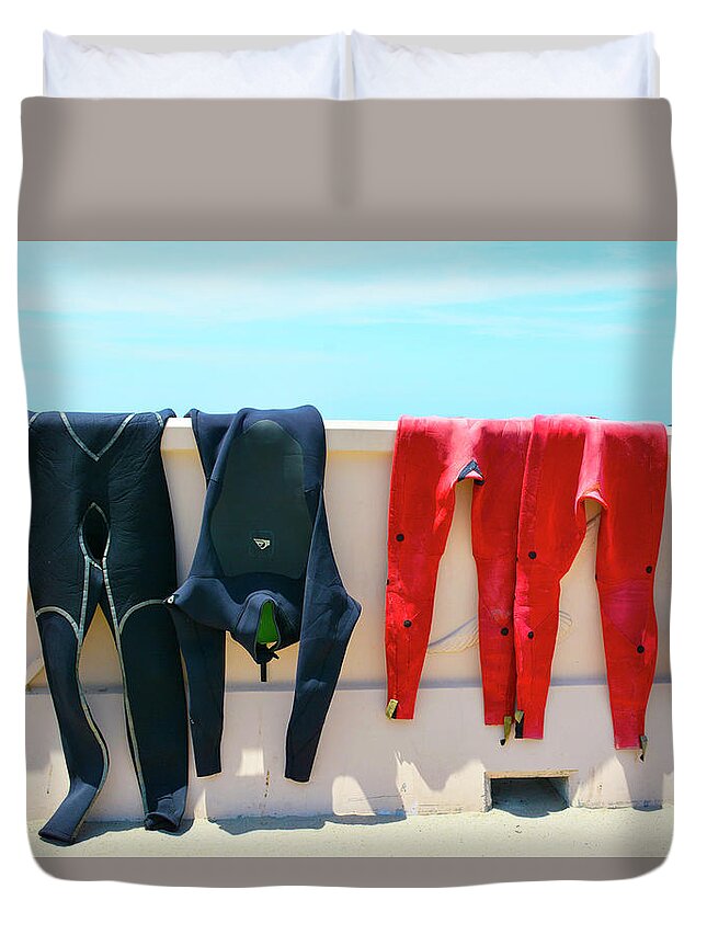Wetsuits Surfer Colorful Beach Wall Sea Blue Sky Red Yellow Sport Water Ocean Waves Human Form Duvet Cover featuring the photograph Hang Ten by Jennifer Wright
