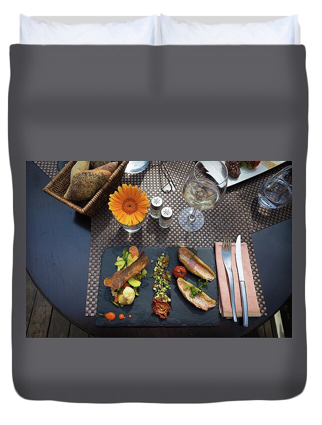 Fork Duvet Cover featuring the photograph Health fish dish served at a French restaurant by Semmick Photo