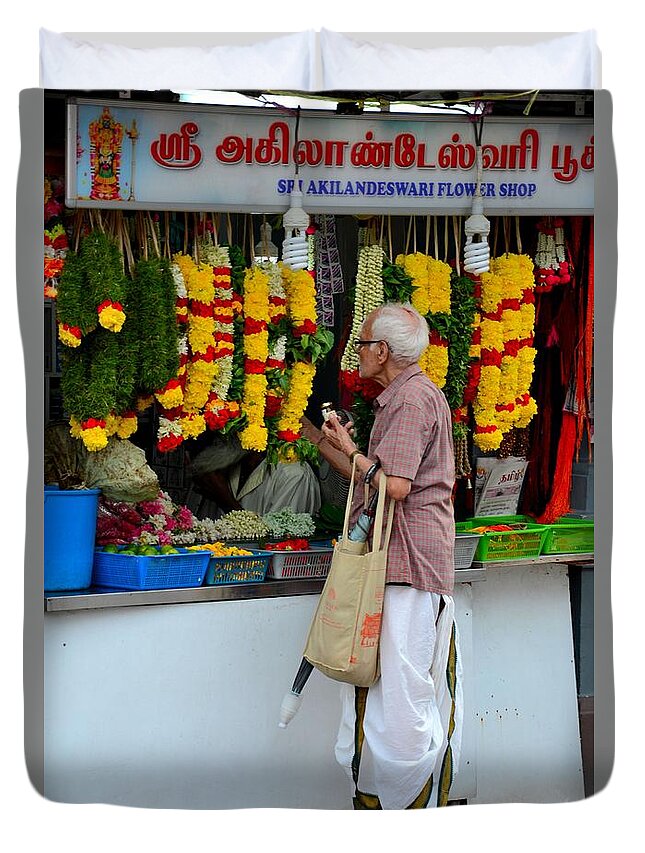 Singapore Duvet Cover featuring the photograph Indian man stands at Little India flower garland shop Singapore by Imran Ahmed
