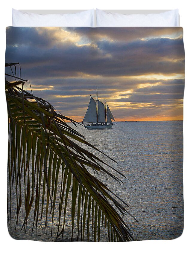 Silhouette Duvet Cover featuring the photograph Key West Cloudy Sunset Sailing by Bob Slitzan