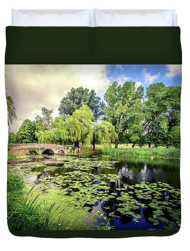 Lily Pond Duvet Cover featuring the photograph Lily Pond of England by John Williams