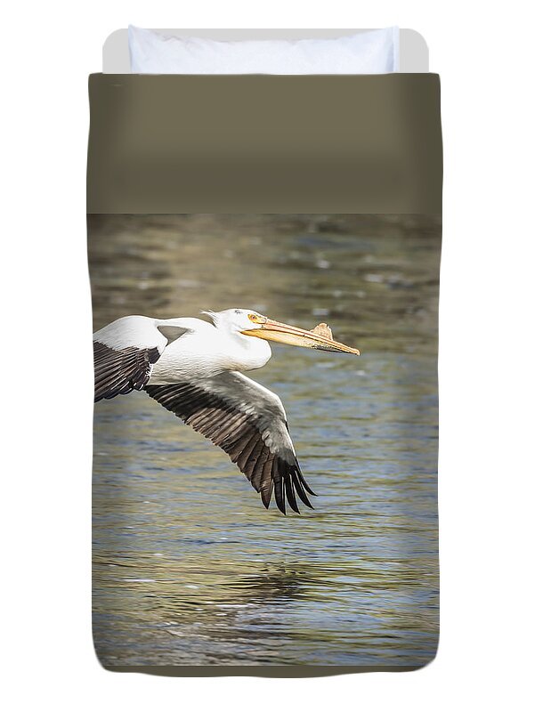 American White Pelican Duvet Cover featuring the photograph Low Flyer by Thomas Young