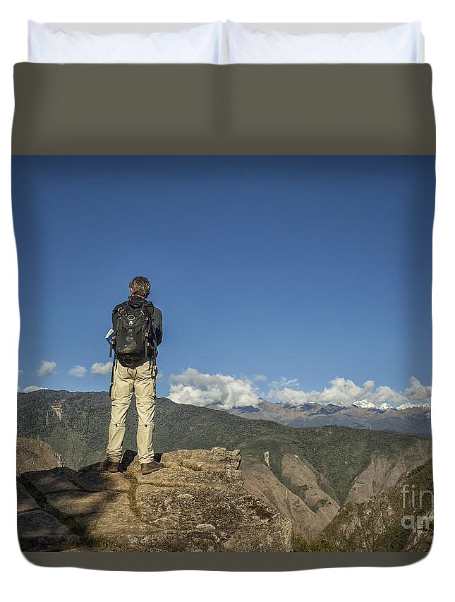 Mountain Duvet Cover featuring the photograph Man on the edge by Patricia Hofmeester