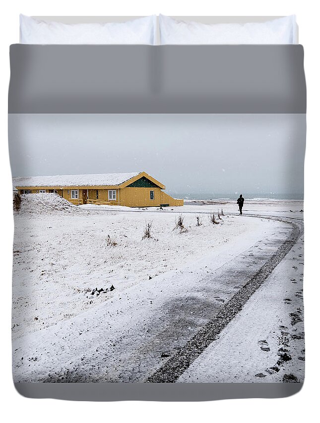 Iceland Duvet Cover featuring the photograph Man walking in snow Iceland by Michalakis Ppalis