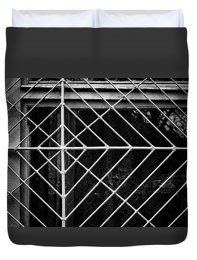 Wall Art Duvet Cover featuring the photograph Metal Spider Web Windowframe in Monochrome by John Williams