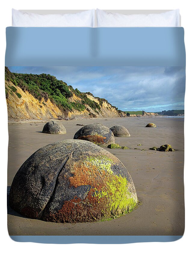New Zealand Duvet Cover featuring the photograph Moeraki Boulders by Cheryl Strahl