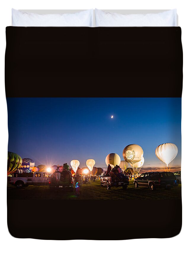 Multiple Hot Air Balloons Duvet Cover featuring the photograph Multiple Hot air Balloons night glow by Charles McCleanon