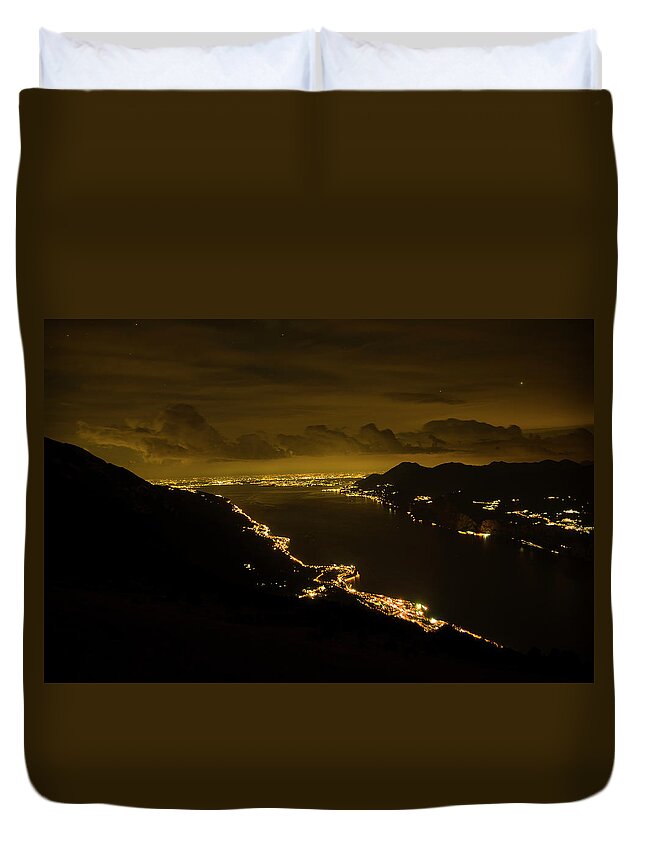 Night Duvet Cover featuring the photograph Night view of lkae Garda from Monte Baldo by Nicola Aristolao