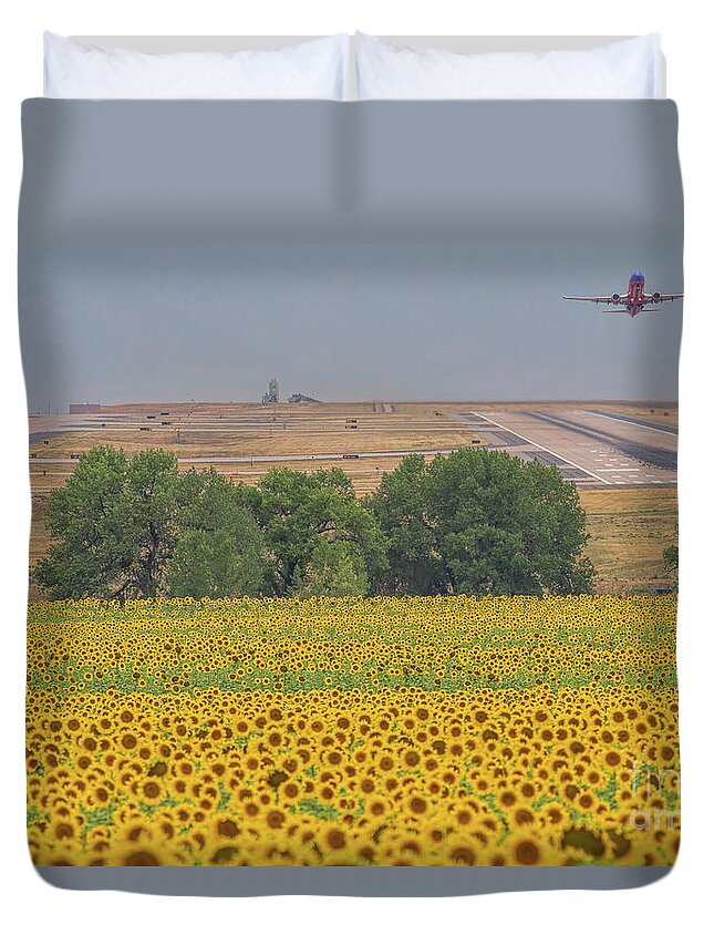 Sunflower Fields Duvet Cover featuring the photograph O'er Fields of Gold by Jim Garrison