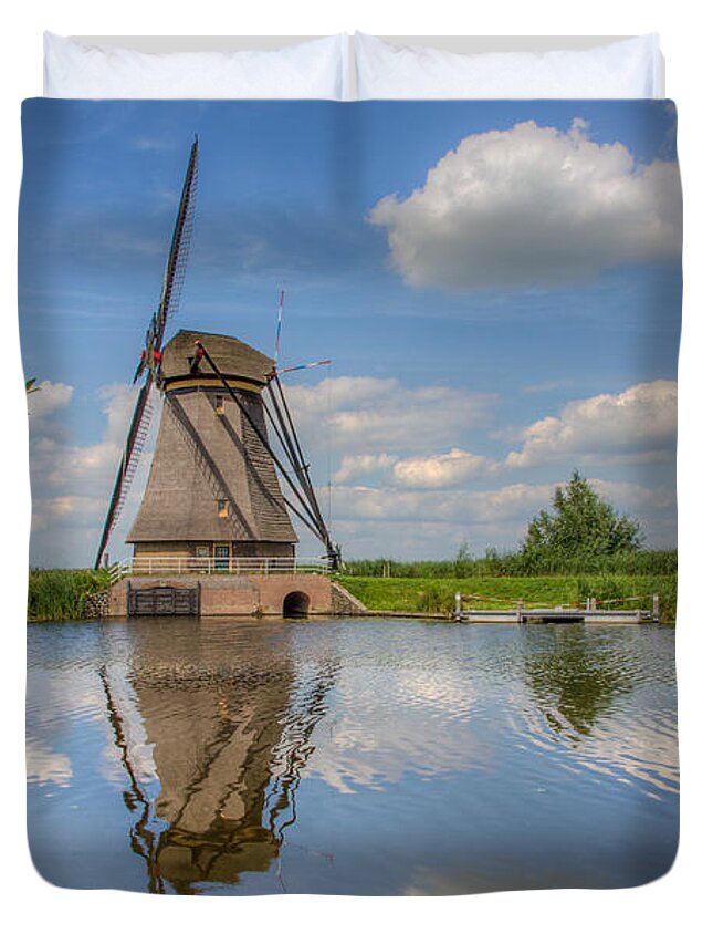 Windmill Duvet Cover featuring the photograph One of the Kinderdijk Windmills in Holland by Clare Bambers
