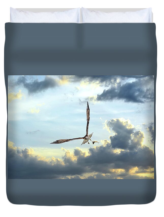 Osprey Duvet Cover featuring the photograph Osprey flying in clouds at sunset with fish in talons by Patrick Wolf