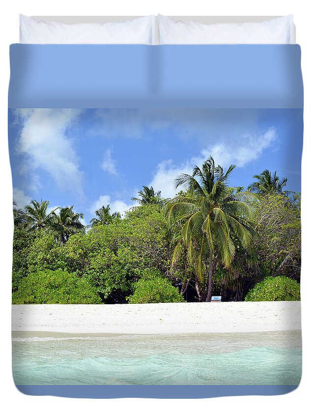 Beach Duvet Cover featuring the photograph Palm trees and exotic vegetation on the beach of an island in Maldives by Oana Unciuleanu