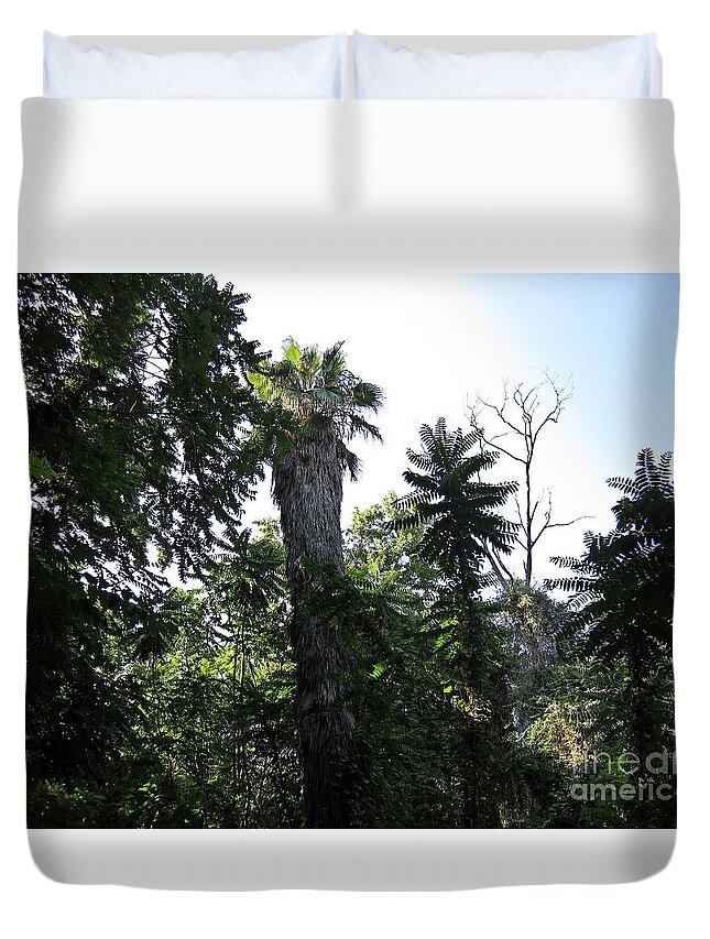 Torremolinos Duvet Cover featuring the photograph Palm trees and wilderness in Torremolinos by Chani Demuijlder