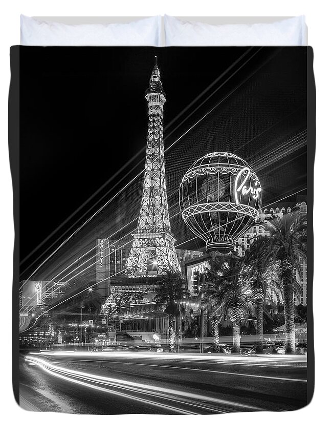 Eifel Tower Duvet Cover featuring the photograph Paris In Las Vegas Strip Light Show BW by Susan Candelario