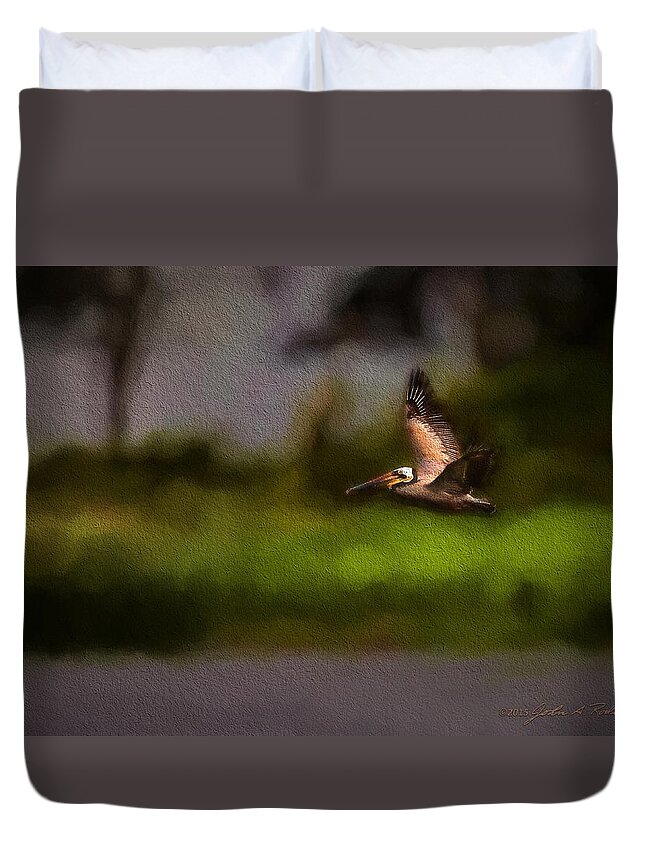 Pelican Duvet Cover featuring the photograph Pelican In Flight by John A Rodriguez