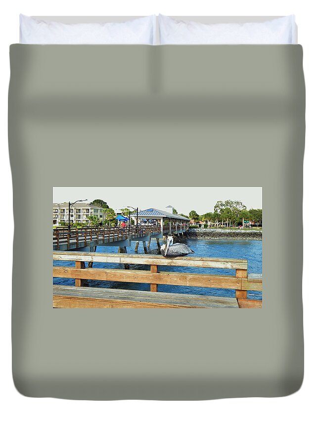 Travel Duvet Cover featuring the photograph Pelican Roost At Pier by Jan Gelders