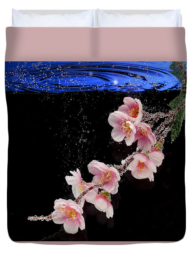 Water Duvet Cover featuring the photograph Pink Blossom in Water with Bubbles by Dmitry Soloviev