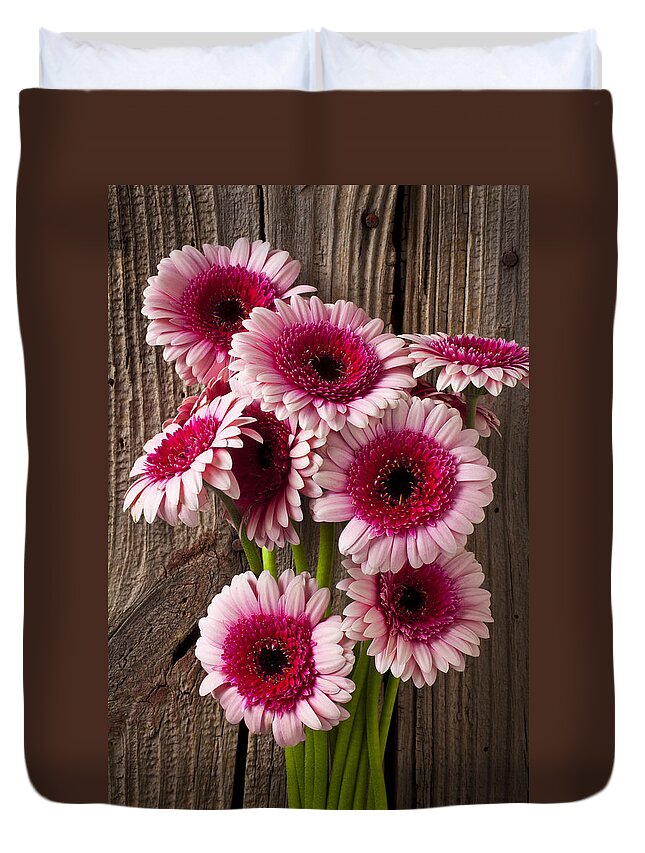 Pink Gerbera Daisies Duvet Cover featuring the photograph Pink Gerbera daisies by Garry Gay
