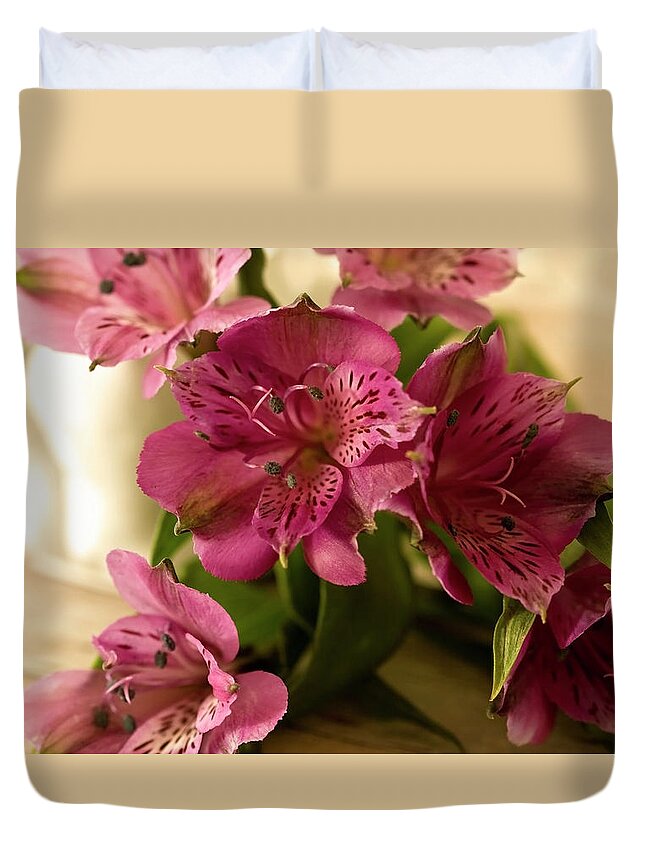 Pink Duvet Cover featuring the photograph Pink Peruvian Lilies in Repose by Cheryl Day