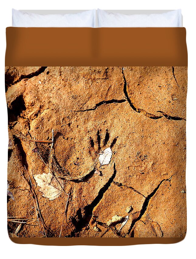 Paw Print Duvet Cover featuring the photograph Raccoon Paw in Drought by Kathy Barney