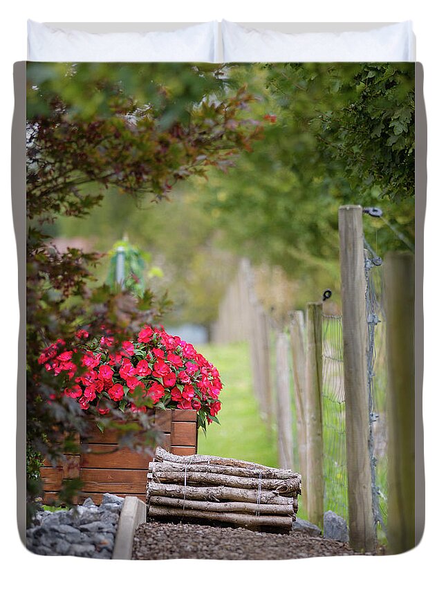 Country Duvet Cover featuring the photograph Red flowerd with Fende and wood billet bundle by Amanda Mohler