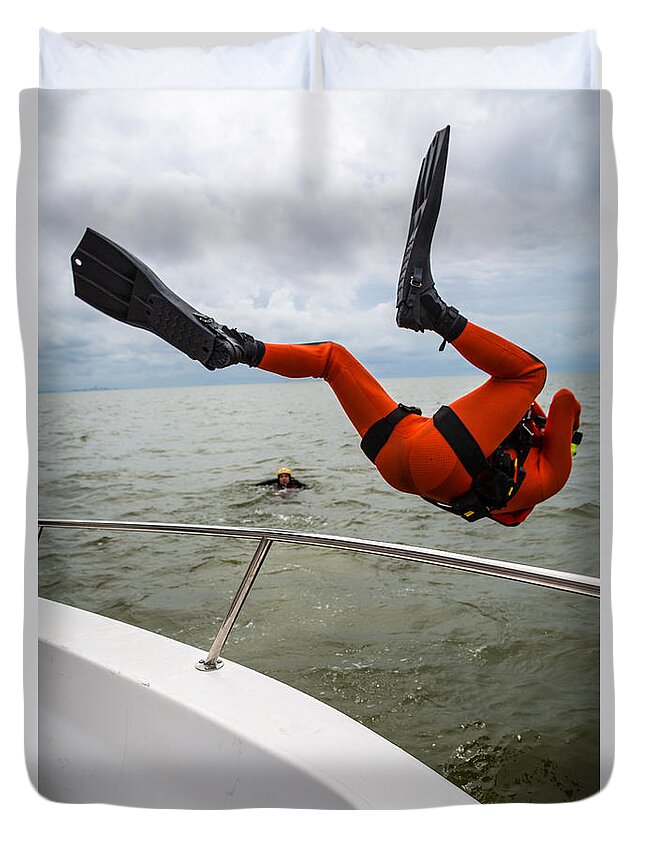 Us Coast Guard Duvet Cover featuring the photograph Rescue Swimmer Overboard by Gregory Daley MPSA
