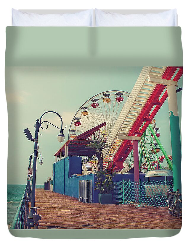 Santa Monica Pier Duvet Cover featuring the photograph Ride it Out by Laurie Search