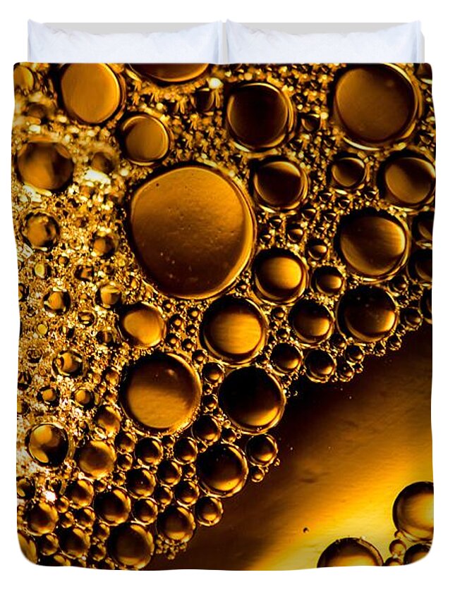 Oil And Water Water Oil Macro Closeup Gold Bruce Pritchett Photography Duvet Cover featuring the photograph River of Gold by Bruce Pritchett