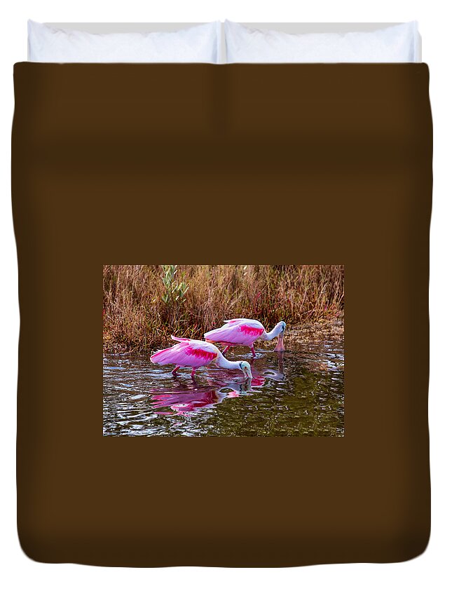 Birds Duvet Cover featuring the photograph Roseate Spoonbills Swishing for Food by John M Bailey