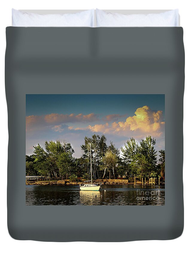 Boat Duvet Cover featuring the photograph Sailboat in the bay by Les Greenwood