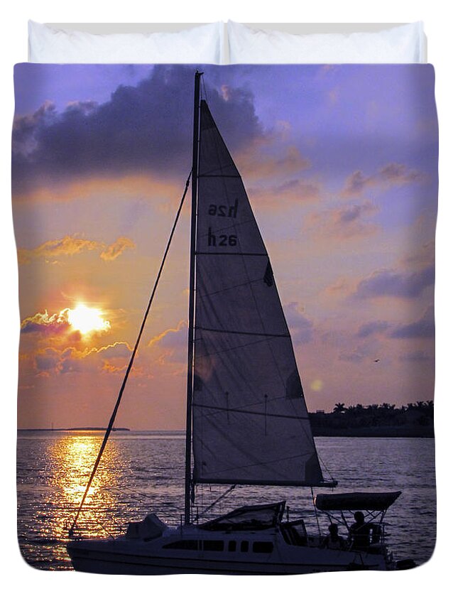 Sunset Duvet Cover featuring the photograph Sailing Home Sunset in Key West by Bob Slitzan