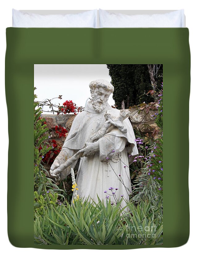 Saint Francis Duvet Cover featuring the photograph Saint Francis Statue in Carmel Mission Garden by Carol Groenen
