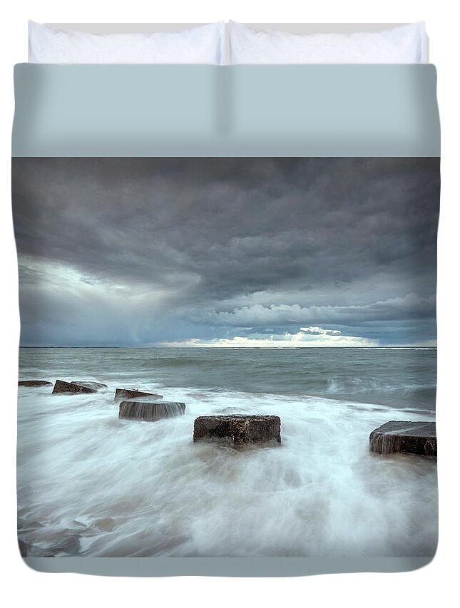 Sea Defenses Duvet Cover featuring the photograph Sea defenses at high tide by Anita Nicholson