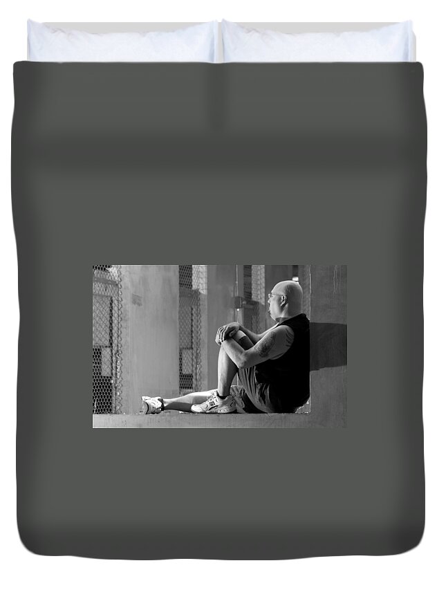 Portrait Duvet Cover featuring the photograph Seated in the Darkness by Angus HOOPER III