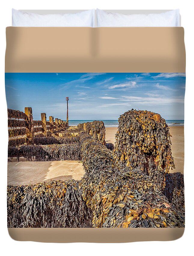 Sheringham Duvet Cover featuring the photograph Seaweed Covered by Nick Bywater