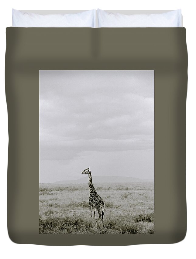 Inspiration Duvet Cover featuring the photograph Serengeti Solitude by Shaun Higson