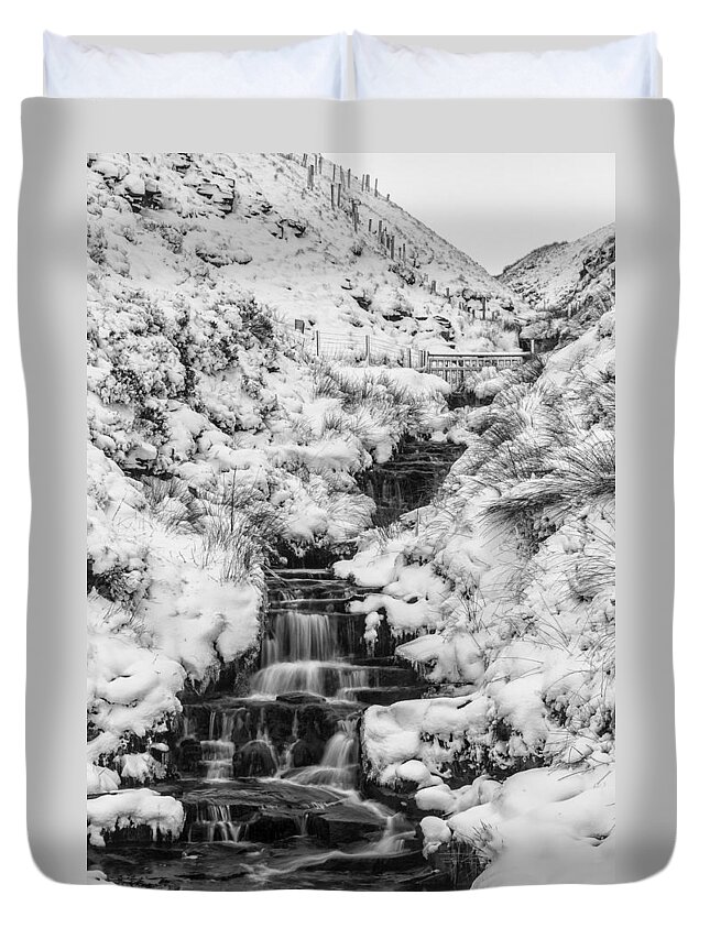 Black And White Duvet Cover featuring the photograph Snowy waterfall in the Peak District in Derbyshire by Neil Alexander Photography