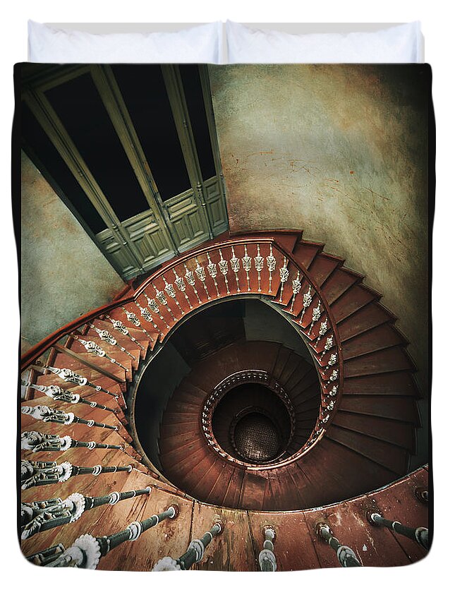 Spiral Duvet Cover featuring the photograph Spiral staircase in red and brown tones by Jaroslaw Blaminsky