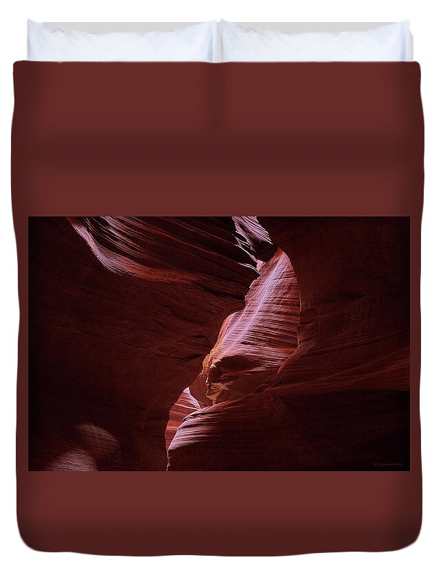 Light Beams Duvet Cover featuring the photograph Stone Face by Lucinda Walter