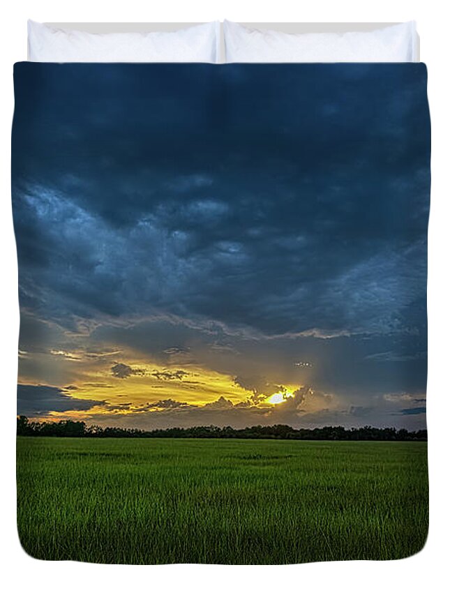 Weather Duvet Cover featuring the photograph Storm at Sunset by Christopher Holmes